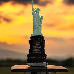 Figure Statue of Liberty on the Cover of An Empty American Cream Liqueur Bottle